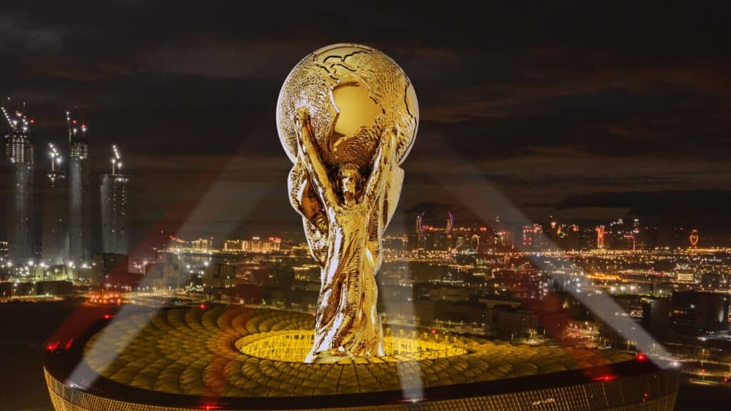 Copa 2026: taça do mundial em tamanho grande, posicionada no centro de um estádio de futebol